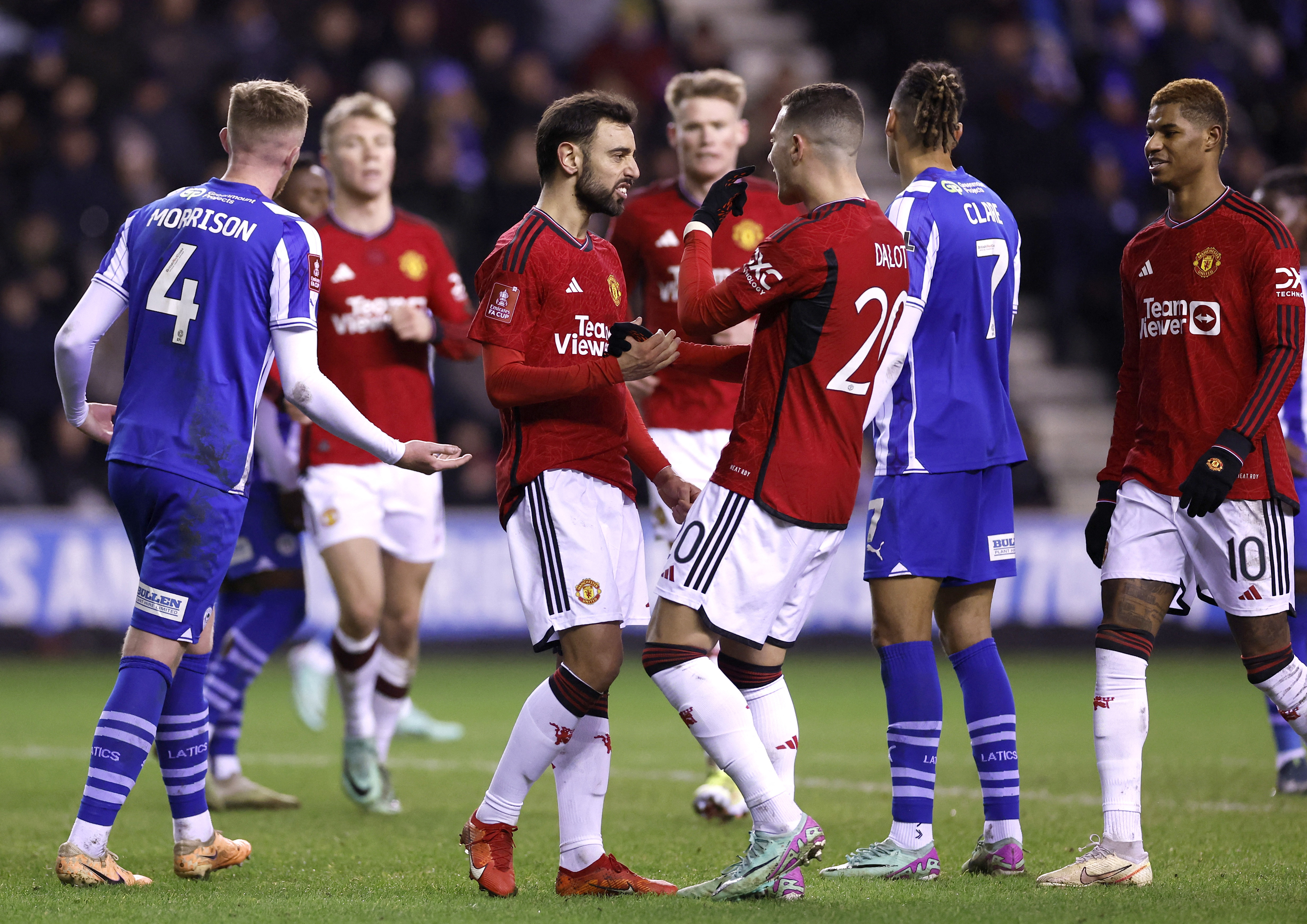 Red Devils' scorers Bruno Fernandes and Diogo Dalot celebrate