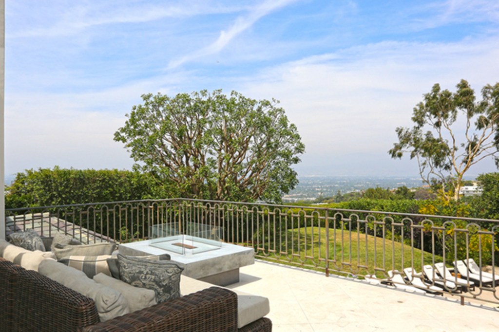 A view looking into the backyard and the neighborhood beyond the home.