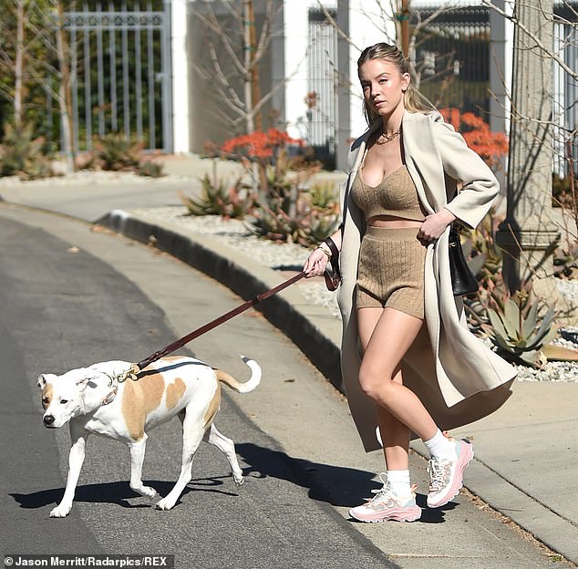 Style factor: Sweeney's toned legs were on full display as she strutted her stuff in a pair of SOREL Kinetic Breakthru Tech Lace Sneaker in Eraser Pink