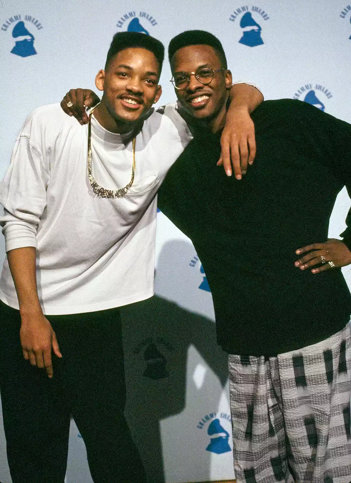 LOS ANGELES - FEBRUARY 21: The 32nd Annual Grammy Awards, presented at Shrine Auditorium, Los Angeles. Broadcast on CBS television on February 21, 1990. An event recognizing the achievements and talents of singers, musicians, and music industry persons. Pictured left to right: Rapper Will Smith and hip hop artist DJ Jazzy Jeff