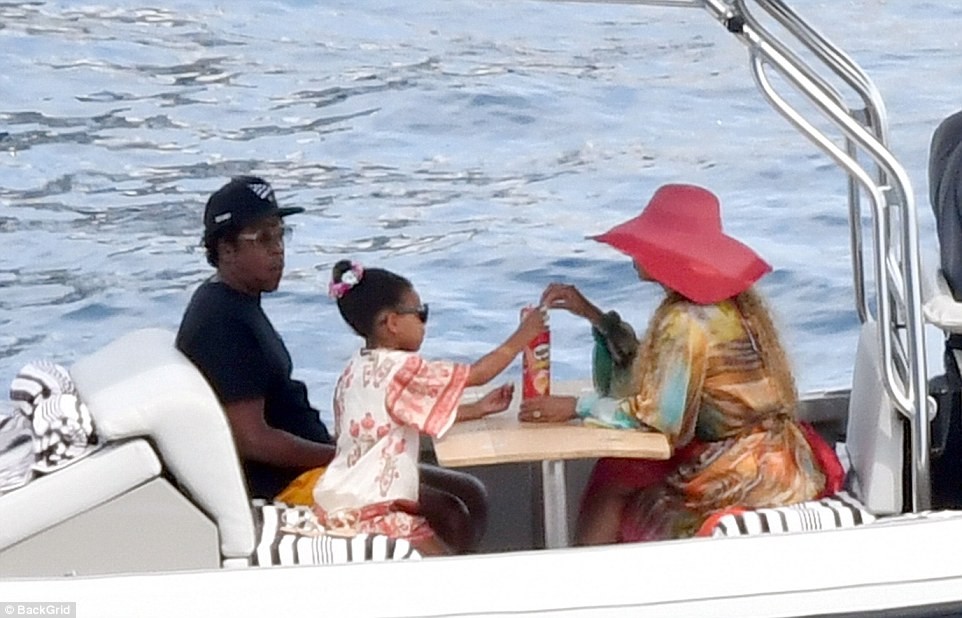 Beyonc� and Jay-Z enjoy a relaxing afternoon on $180million luxury yacht with their three children in Capri (Photos)