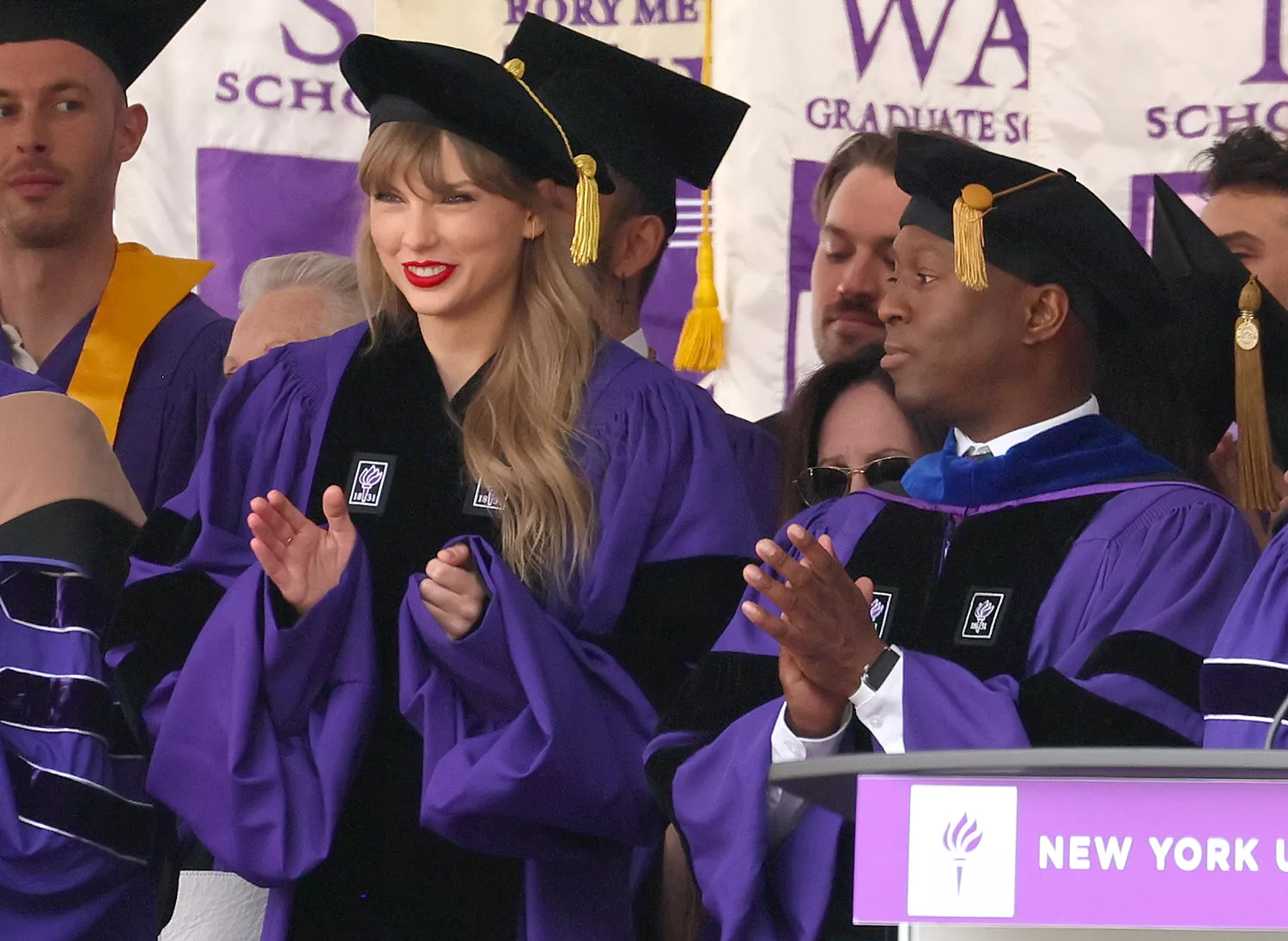 Taylor Swift and Jason King, Chair of the Clive Davis Institute of Recorded Music arrive to deliver the New York University 2022 Commencement Address at Yankee Stadium on May 18, 2022 in New York City.