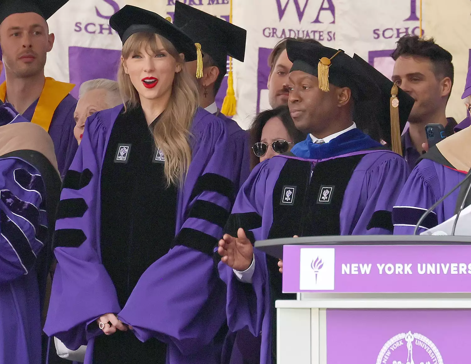 Taylor Swift and Jason King, Chair of the Clive Davis Institute of Recorded Music arrive to deliver the New York University 2022 Commencement Address at Yankee Stadium on May 18, 2022 in New York City