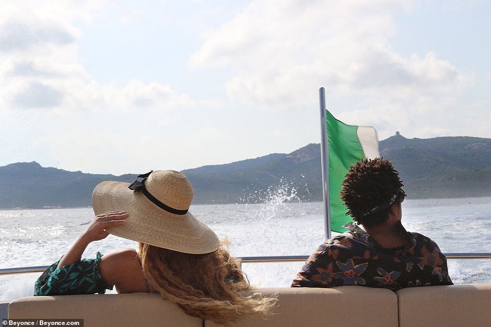 Enjoying the views: They overlooked the water aboard the luxury liner