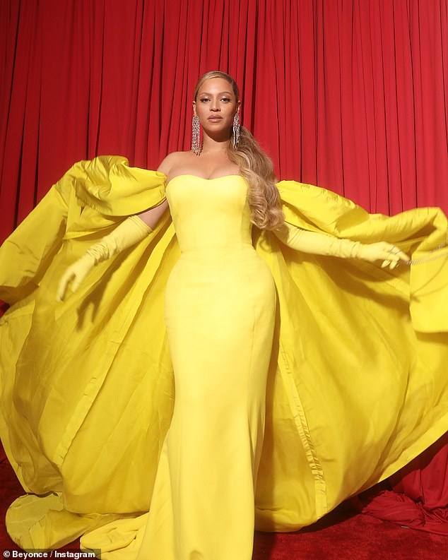 Solo: On the Maison Valentino Instagram page it was explained, '@beyonce chose to wear a custom #ValentinoHauteCouture yellow cape and dress to this year's #Oscars, designed for her by @pppiccioli and styled by @marnixmarni'