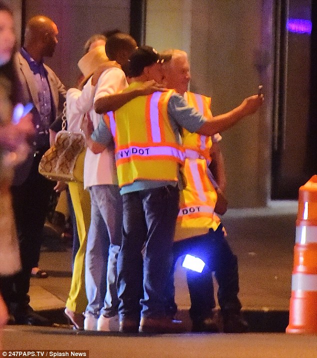 Get into Formation! The power couple stopped for pictures with workmen