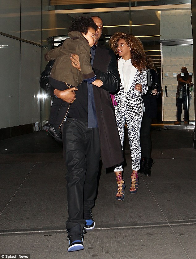 Jay-Z and Beyonce look very much the proud parents as they step out in Manhattan