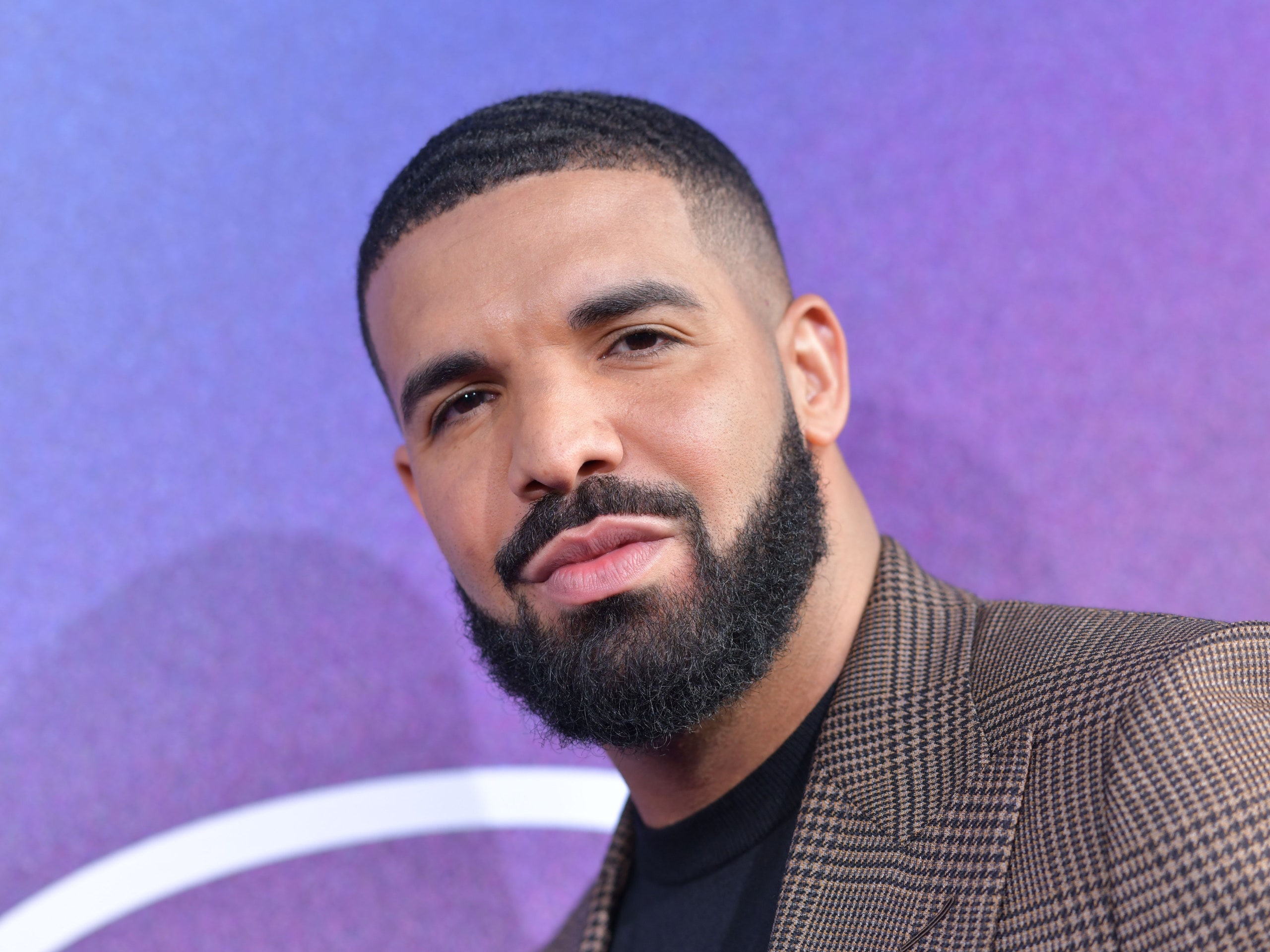 Drake Says His Recent Hair Loss Is a Side Effect of COVID-19 | SELF